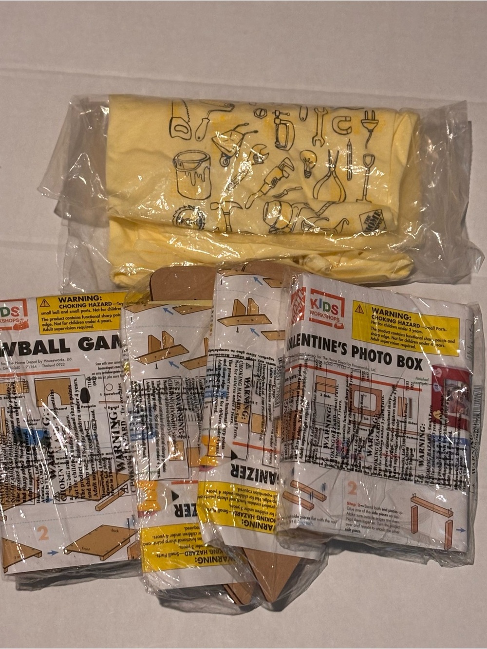 The Home Depot bundle of  4  Workshop DIY kits Sealed  pin  and t-shirt children